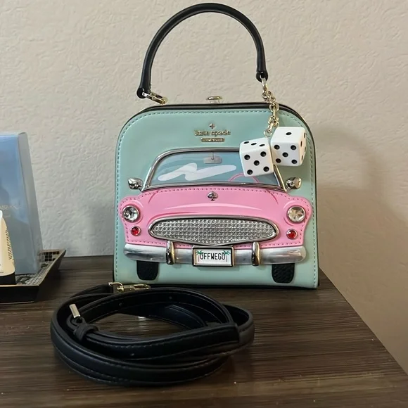 SOLD!! Kate Spade Checking In Car Violina - Picture 1 of 4
